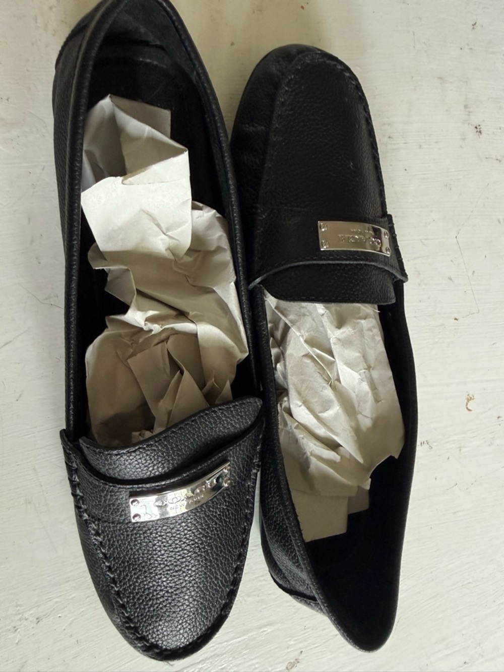 Coach Black Pebble Leather Slip-On Loafers with Silver Accent